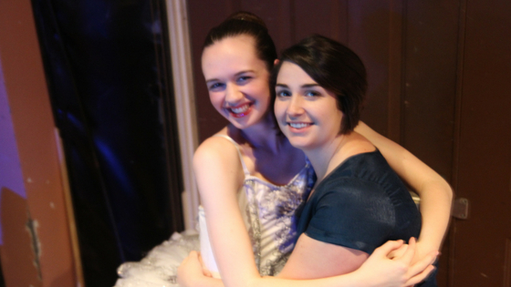 Miss Gabby and Miss Lainy share a hug backstage before she hits the stage for her last solo. 